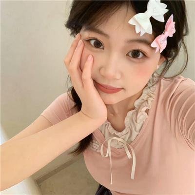 桃花含露又春风